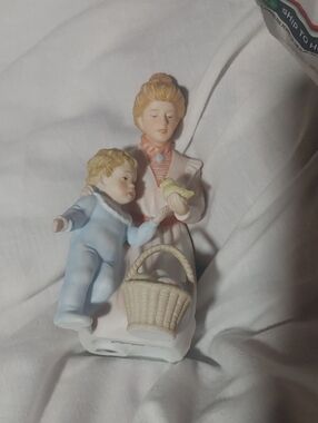 Porcelain Mother and Child Figurine in Pastel Colors